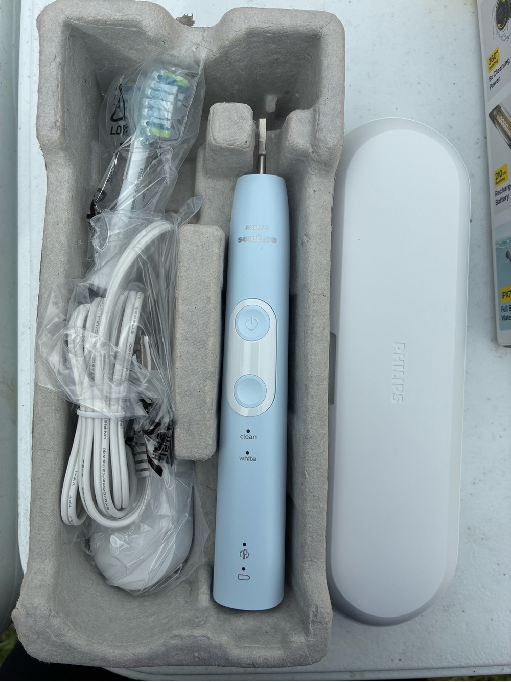 Philips Sonicare Rechargeable Toothbrush in Light Blue and White Travel Case